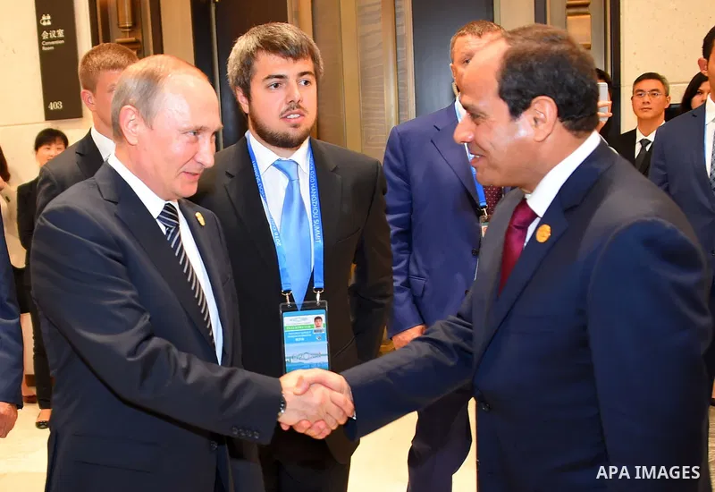 Egypt's President Abdel Fattah al-Sisi shakes hands with Russian President Vladimir Putin, at a sideline meeting on the G20 Summit in Hangzhou on September 5, 2016. G20 leaders confront a sluggish global economy and the...