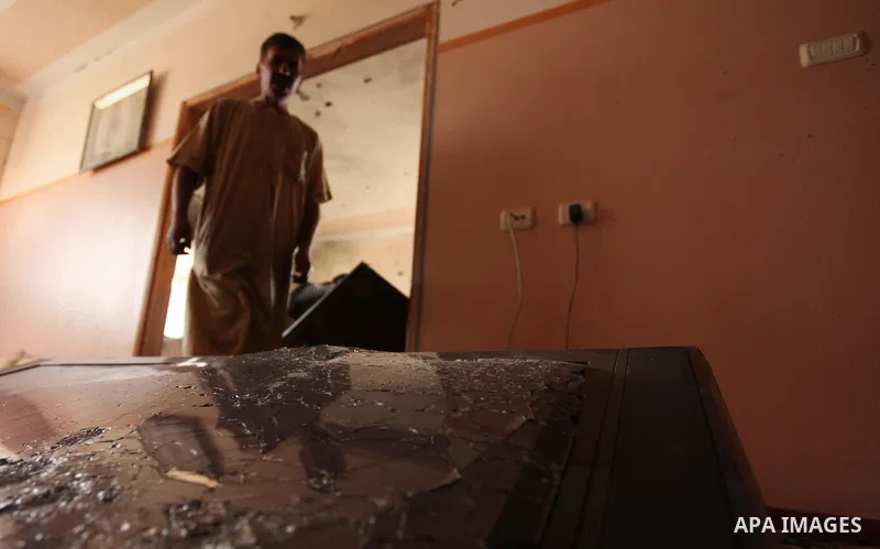 A Palestinian man inspects his house after it was hit by Israeli tank fire on September 6, 2016 in Beit Hanun in the northern Gaza Strip. Israel's army targeted Hamas posts in the Gaza Strip with tank fire after gunfire...