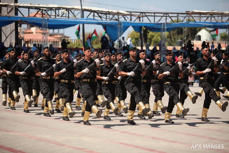 Members of the Palestinian security forces take part in a graduation ceremony in Gaza City on September 6, 2016. Photo by Ashraf Amra