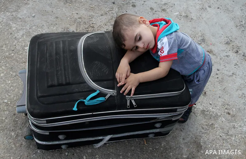 Palestinians wait for travel permits to cross into Egypt through the Rafah border crossing, on September 6, 2016 in the southern Gaza Strip. Egyptian authorities temporarily reopened it both directions in Gaza Strip, pat...