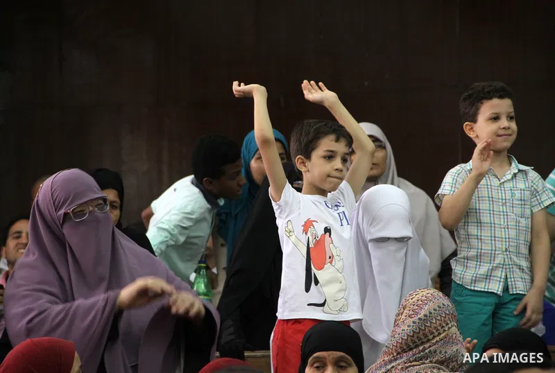 Relative of Egyptian Muslim Brotherhood defendants attend their trial, in a case known in media as "Rabaa Operations Room", in Cairo, on Sep. 06, 2016. Photo by Amr Sayed