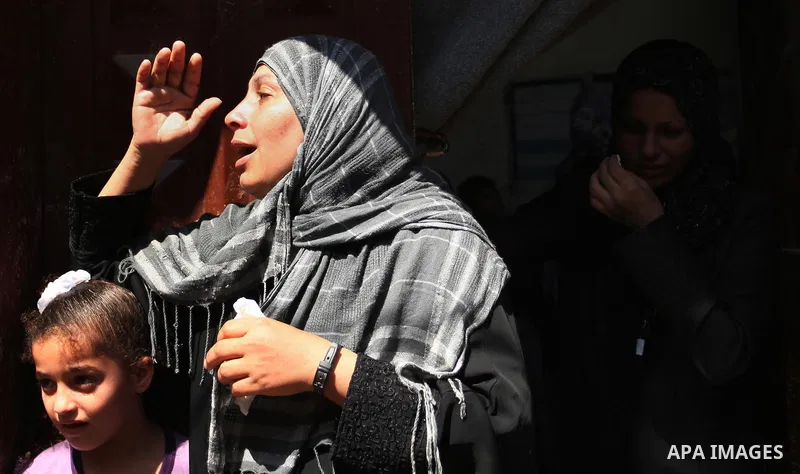 Relatives of Abdel-Rahman Al-Dabbagh, an 18-year-old Palestinian who was killed on Friday during a rock-throwing protest near the Gaza-Israel border, mourn during his funeral in central Gaza Strip September 10, 2016. Pho...