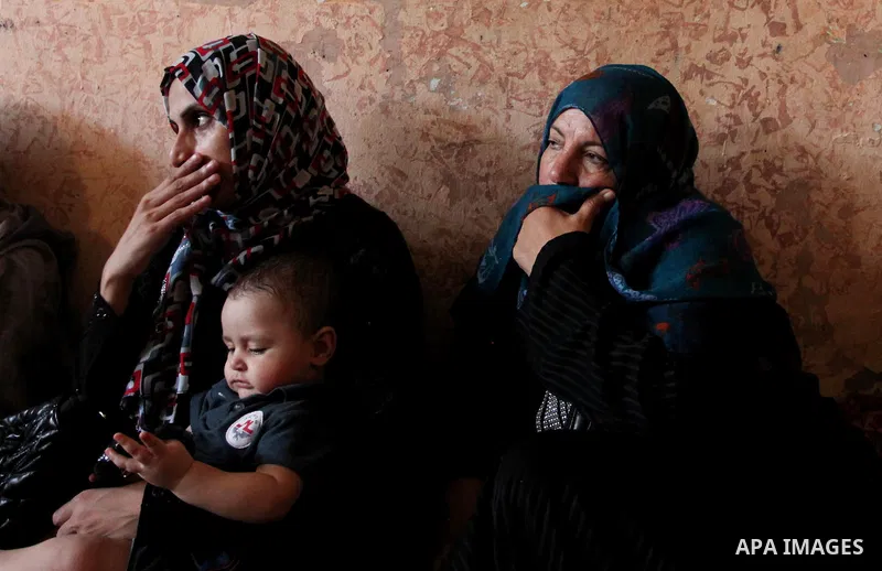 Relatives of Abdel-Rahman Al-Dabbagh, an 18-year-old Palestinian who was killed on Friday during a rock-throwing protest near the Gaza-Israel border, mourn during his funeral in central Gaza Strip September 10, 2016. Pho...