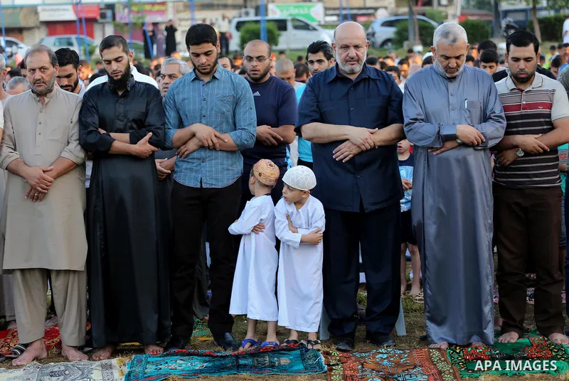 Palestinians attend the prayers of Eid al-Adha or the feast of sacrifice, in Gaza city on Sep. 12, 2016. Muslims around the world are celebrating Eid al-Adha, the Festival of Sacrifice, to mark the end of the hajj pilgri...