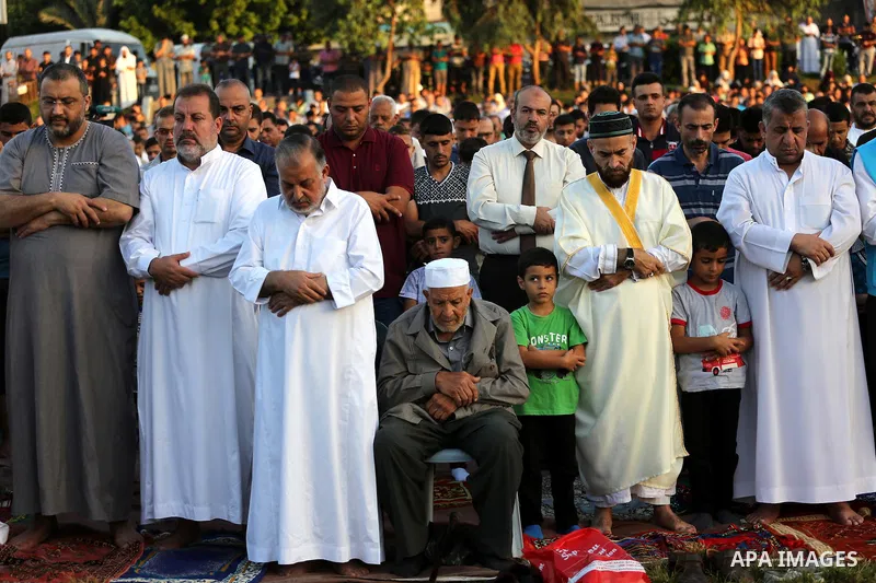 Palestinians attend the prayers of Eid al-Adha or the feast of sacrifice, in Gaza city on Sep. 12, 2016. Muslims around the world are celebrating Eid al-Adha, the Festival of Sacrifice, to mark the end of the hajj pilgri...