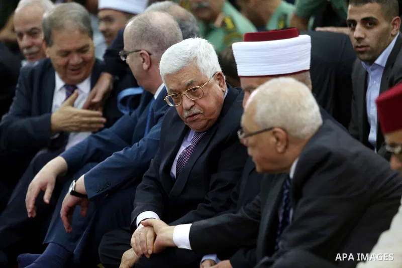 Palestinian president Mahmoud Abbas attends pray to mark the first day of Eid al-Adha, or feast of the sacrifice, at his headquarter in the West Bank city of Ramallah, on Sep. 12, 2016. Muslims around the world are celeb...