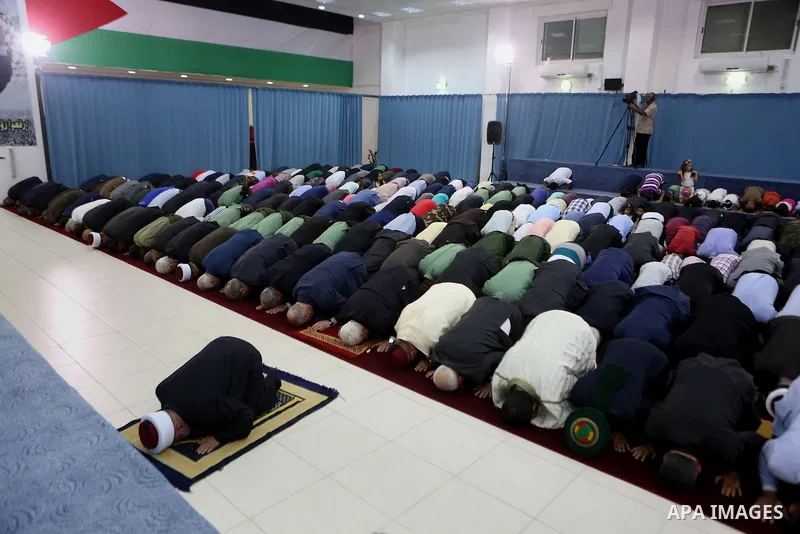 Palestinian president Mahmoud Abbas attends pray to mark the first day of Eid al-Adha, or feast of the sacrifice, at his headquarter in the West Bank city of Ramallah, on Sep. 12, 2016. Muslims around the world are celeb...