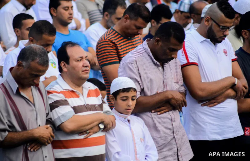 Muslim Egyptians perform the morning prayer of the Eid al-Adha holiday at Amr Ibn al-Aas mosque in the capital Cairo on September 12, 2016. Muslims across the world celebrate the annual festival of Eid al-Adha, or the fe...