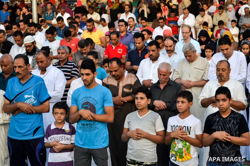 Muslim Egyptians perform the morning prayer of the Eid al-Adha holiday at Amr Ibn al-Aas mosque in the capital Cairo on September 12, 2016. Muslims across the world celebrate the annual festival of Eid al-Adha, or the fe...