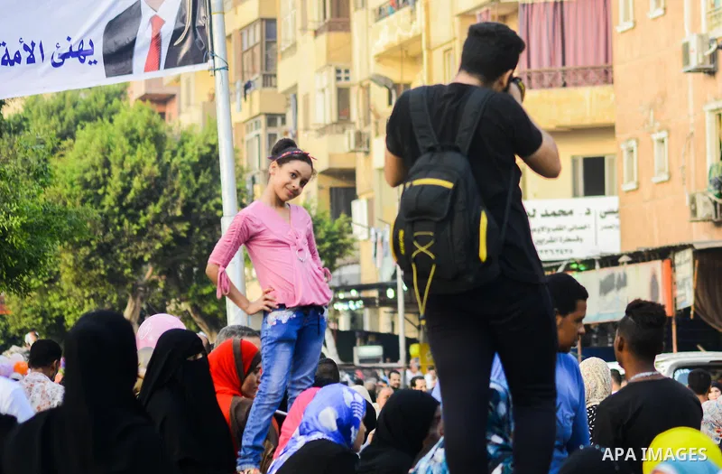 Muslim Egyptians celebrate following the morning prayer of the Eid al-Adha holiday in the capital Cairo on September 12, 2016. Muslims across the world celebrate the annual festival of Eid al-Adha, or the festival of sac...