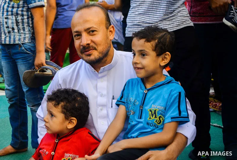 Muslim Egyptians celebrate following the morning prayer of the Eid al-Adha holiday in the capital Cairo on September 12, 2016. Muslims across the world celebrate the annual festival of Eid al-Adha, or the festival of sac...