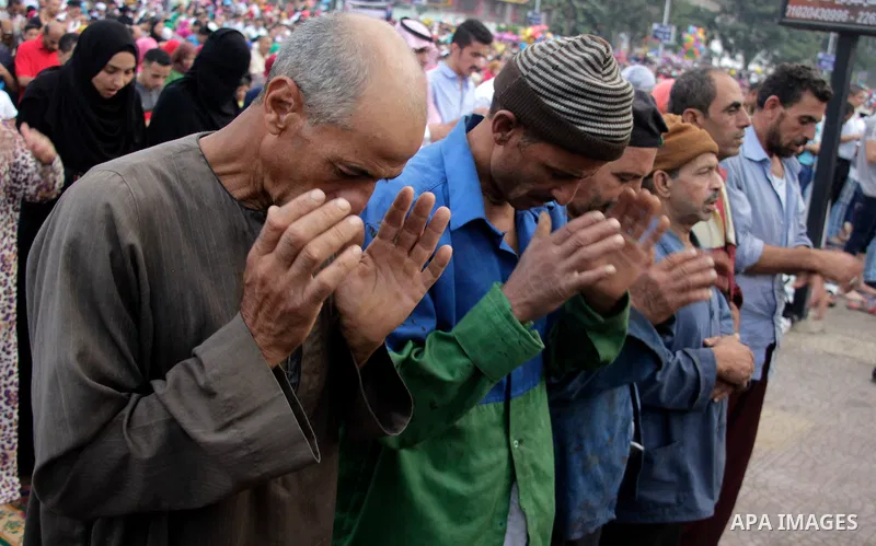 Muslim Egyptians perform the morning prayer of the Eid al-Adha holiday at Mustafa Mahmoud Square in the capital Cairo on September 12, 2016. Muslims across the world celebrate the annual festival of Eid al-Adha, or the f...