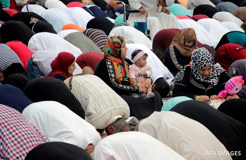 Muslim Egyptians perform the morning prayer of the Eid al-Adha holiday at Mustafa Mahmoud Square in the capital Cairo on September 12, 2016. Muslims across the world celebrate the annual festival of Eid al-Adha, or the f...