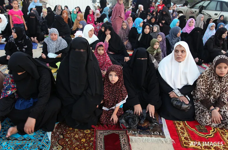 Palestinians attend the morning prayer of the Muslim holiday of the Eid al-Adha on September 12, 2016, in Khan Younis in the southern Gaza strip. Muslims across the world celebrate the annual festival of Eid al-Adha, or...