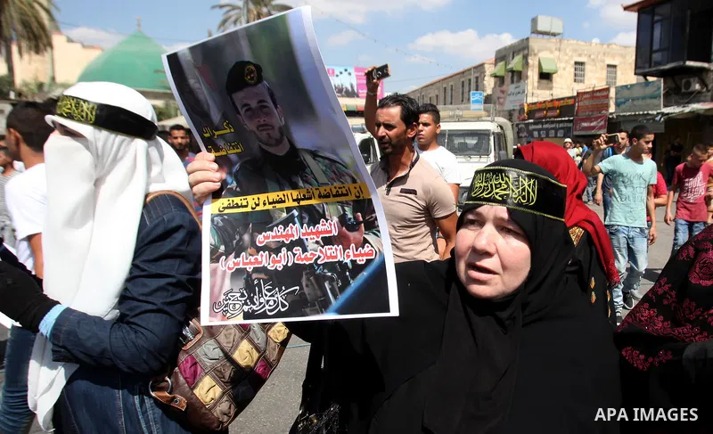 Palestinian supporters of the Islamic Jihad Movement take part in a protest to show solidarity with Palestinians in Jerusalem and Palestinian prisoner in Israeli jails, in the West Bank city of Jenin on Sep. 16, 2016. Ph...