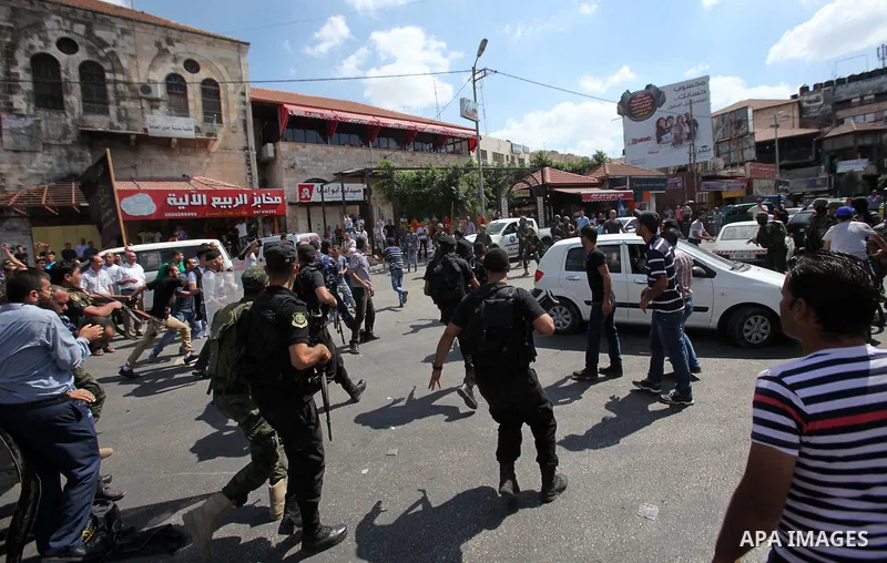 Palestinian security forces prevent supporters of the Islamic Jihad Movement from staging a demonstration in the West Bank city of Jenin on September 16, 2016. Photo by Nedal Eshtayah