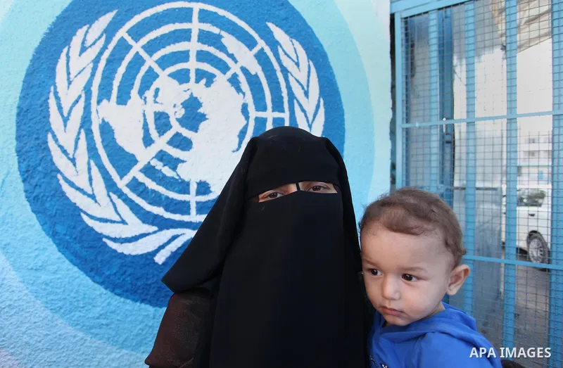 Palestinian teachers and graduates take part a protest demanding their rights in front of the headquarters United Nations Relief and Works Agency (UNRWA), in Gaza City, on Sept. 18, 2016. Photo by Ashraf Amra