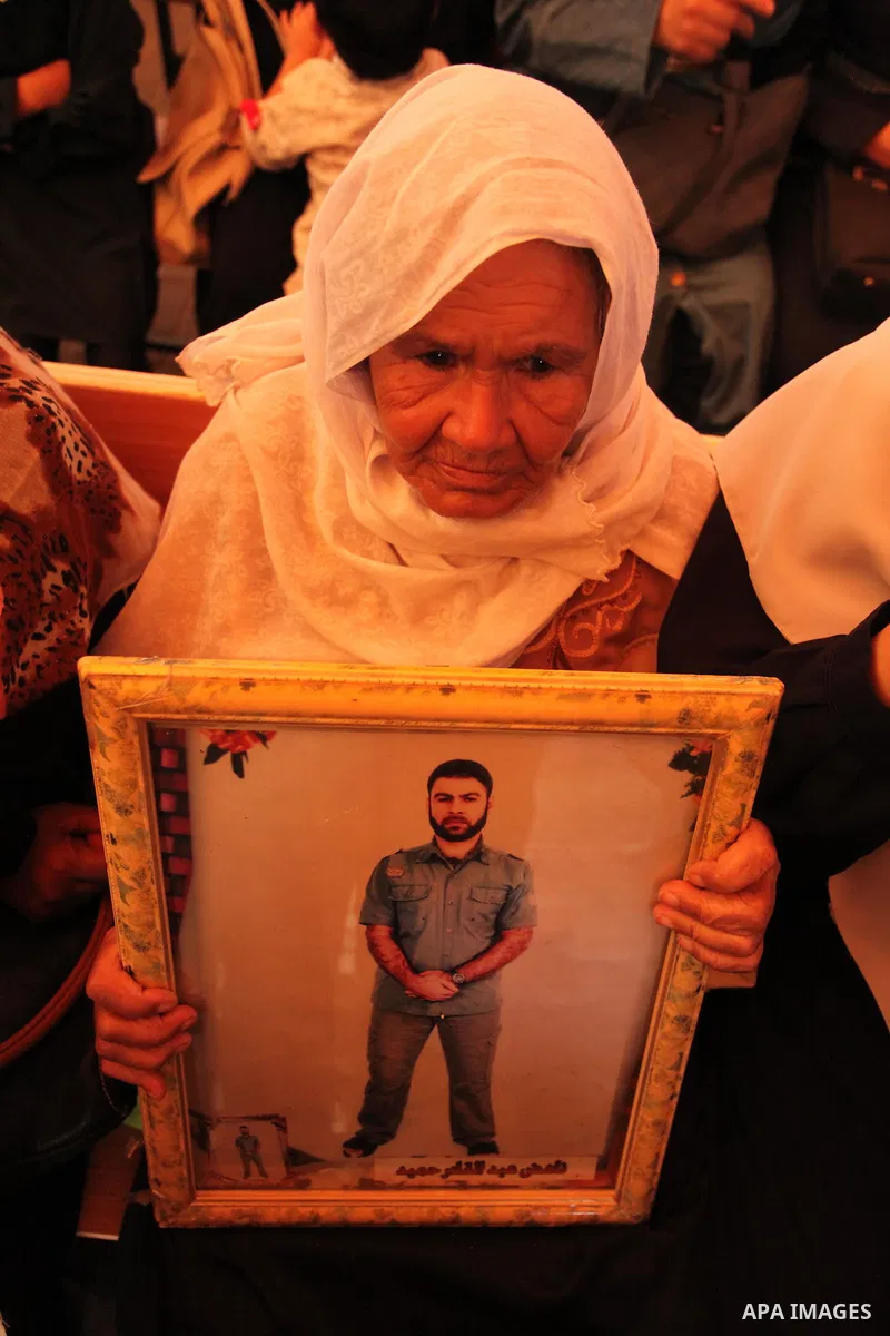 Palestinians take part in a protest demanding release the Palestinian prisoners in Israeli jails, in front of Red cross office in Gaza city, on Sept. 19, 2016. Photo by Ashraf Amra