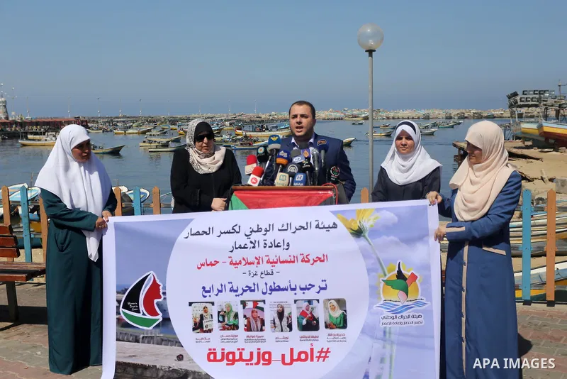 Spokesman of the National Commission to break the siege Adham Abu Salmiya, speaks during a press conference at the seaport in Gaza city on Sept. 20, 2016. Photo by Mohammed Asad