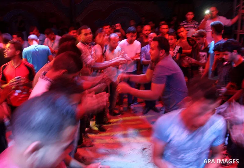 Palestinians celebrate during a traditional wedding party in Arabic "Henna's Night" in Rafah in the southern Gaza strip on Sep. 20, 2016. Palestinians perform the traditional dancing style derived from their folklore, th...