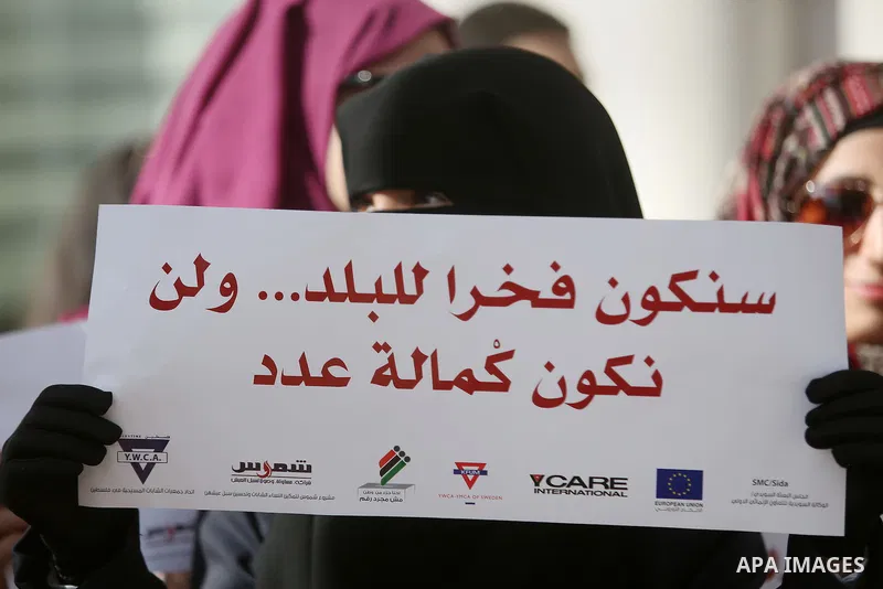 Palestinians demonstrate in front of the Supreme Court in the West Bank city of Ramallah calling authorities not to postpone local elections, on September 21, 2016. Palestinian municipal polls scheduled for October 8 wer...