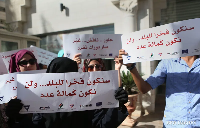 Palestinians demonstrate in front of the Supreme Court in the West Bank city of Ramallah calling authorities not to postpone local elections, on September 21, 2016. Palestinian municipal polls scheduled for October 8 wer...