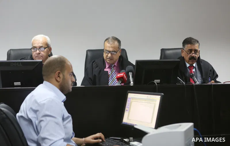 Palestinian high court judges speak in the West Bank city of Ramallah on September 21, 2016 as they announce the delay of local elections. Palestinian municipal polls scheduled for October 8 were officially postponed aft...