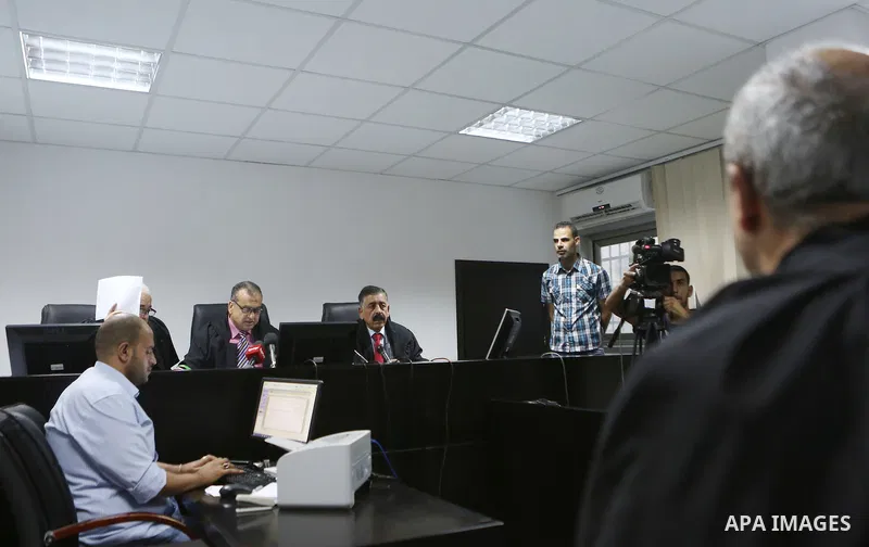 Palestinian high court judges speak in the West Bank city of Ramallah on September 21, 2016 as they announce the delay of local elections. Palestinian municipal polls scheduled for October 8 were officially postponed aft...