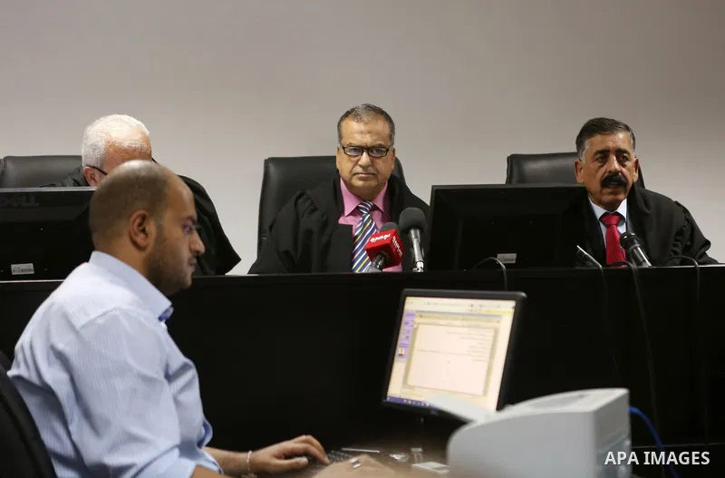 Palestinian high court judges speak in the West Bank city of Ramallah on September 21, 2016 as they announce the delay of local elections. Palestinian municipal polls scheduled for October 8 were officially postponed aft...