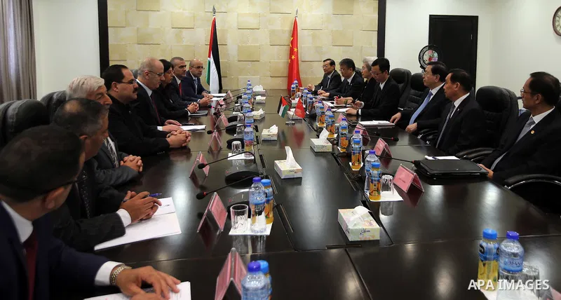 Palestinian Prime Minister, Rami Hamadallah, meets with the Chairman of the House of Representatives of the ruling party in China, Zhang De Jiang, in the West Bank city of Ramallah, on Sept 21, 2016. Photo by Prime Minis...