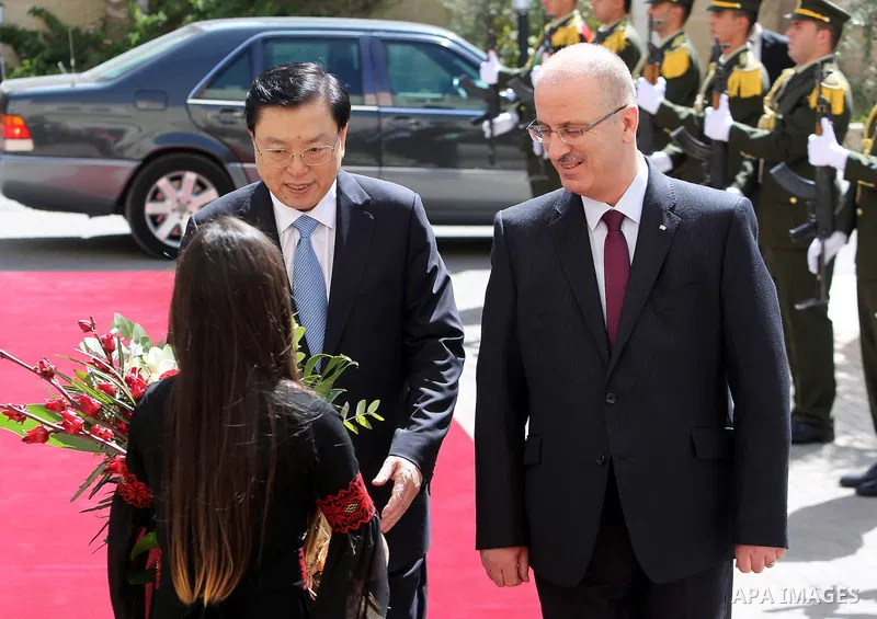 Palestinian Prime Minister, Rami Hamadallah, meets with the Chairman of the House of Representatives of the ruling party in China, Zhang De Jiang, in the West Bank city of Ramallah, on Sept 21, 2016. Photo by Prime Minis...