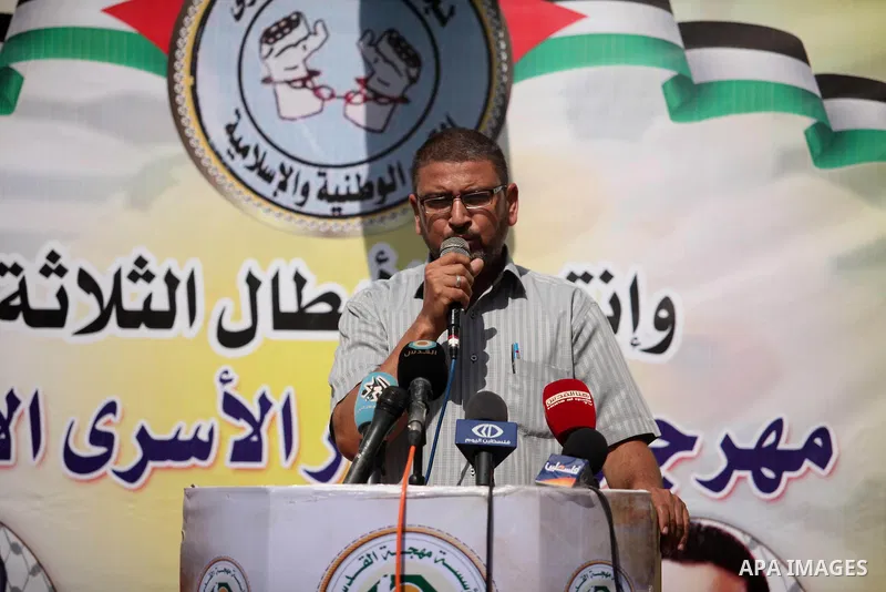 Hamas spokesman Sami Abu Zuhri, speaks during a protest to show solidarity with Palestinian prisoners on hunger strike in Israeli Jails, in front of Red cross office in Gaza city, on Sept. 22, 2016. Photo by Ashraf Amra