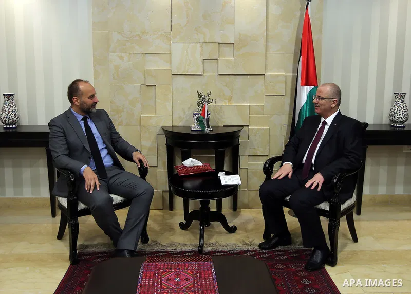 Palestinian Prime Minister, Rami Hamadallah, meets with the Chairman of the Board of Grievances in the Republic of Serbia Sasha Jankovic, in the West Bank city of Ramallah, on Sept 25, 2016. Photo by Prime Minister Offic...
