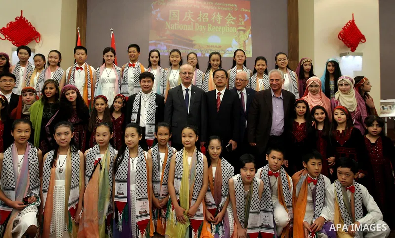 Palestinian Prime Minister Rami Hamdallah attends the Chinese National Day ceremony, in the West Bank city of Ramallah, on Sep. 26, 2016. Photo by Prime Minister Office