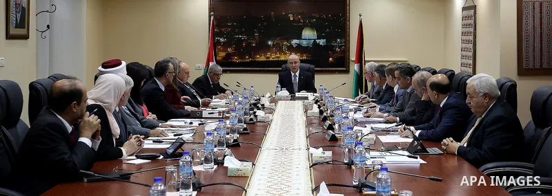 Palestinian Prime Minister, Rami Hamdallah, chairs a meeting of Council of Ministers, in the West Bank city, of Ramallah, Sep. 27, 2016. Photo by Prime Minister Office