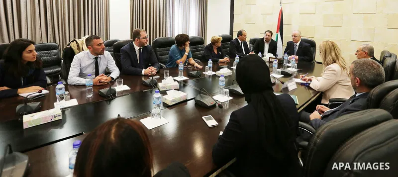 Palestinian Prime Minister, Rami Hamdallah, meets with Head of French Socialist Party (PS) Jean-Christophe Cambadelis, in the West Bank city, of Ramallah, Sep. 27, 2016. Photo by Prime Minister Office