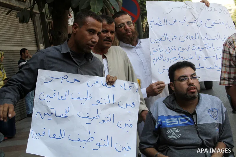 Egyptians disabled take part during a protest to demand their rights in Cairo, Egypt on Sep. 27, 2016. Photo by Amr Sayed