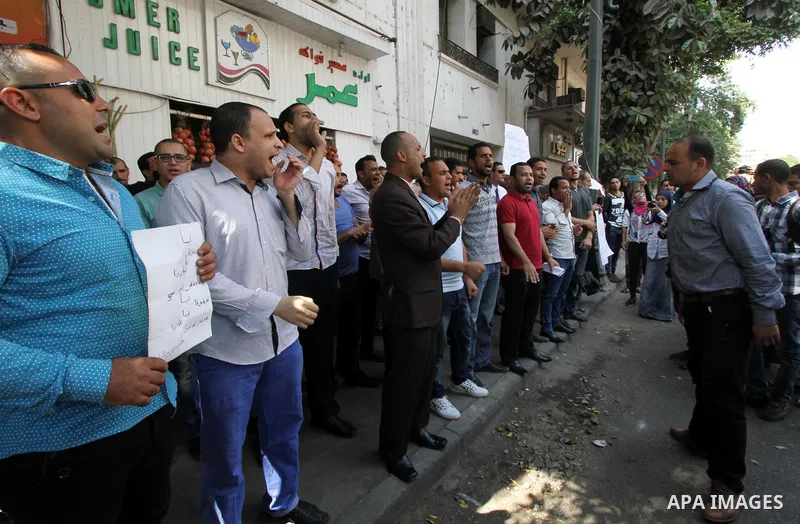 Egyptians Who obtained master's degree take part during a protest to demand jobs in Cairo, Egypt on Sep. 27, 2016. Photo by Amr Sayed