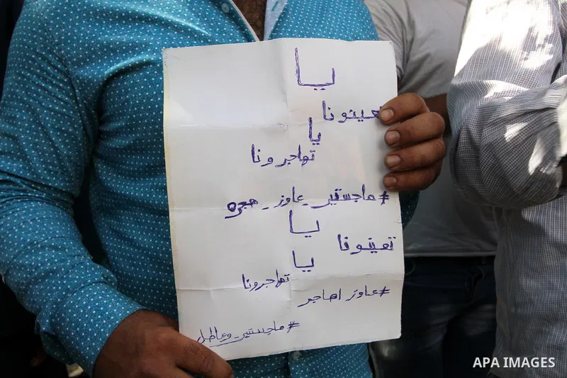 Egyptians Who obtained master's degree take part during a protest to demand jobs in Cairo, Egypt on Sep. 27, 2016. Photo by Amr Sayed