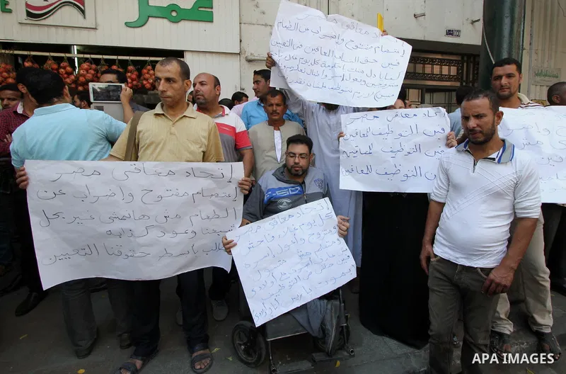 Egyptians disabled take part during a protest to demand their rights in Cairo, Egypt on Sep. 27, 2016. Photo by Amr Sayed