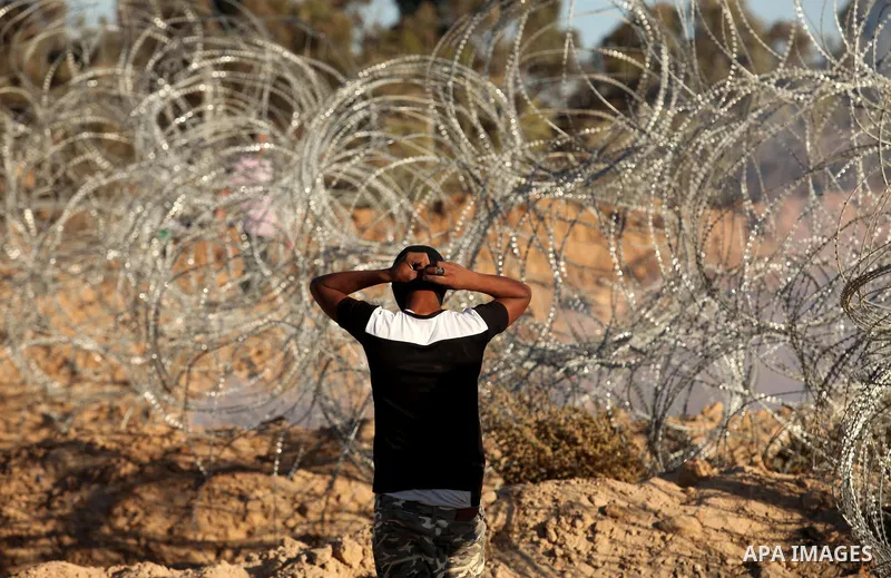 A Palestinian protester takes part during clashes with Israeli security forces near the border between Israel and Central Gaza Strip east of Bureij on Sep. 30, 2016. Photo by Ashraf Amra