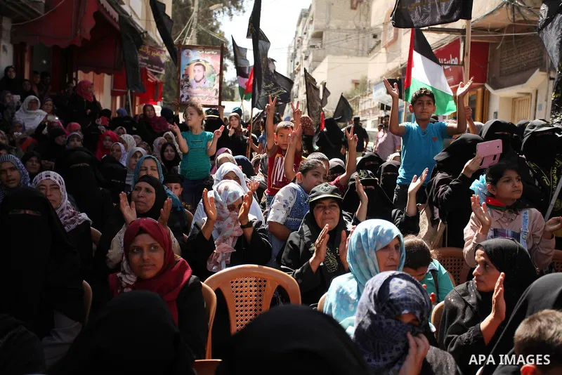 Palestinian supporters of the Islamic Jihad Movement take part in a demonstration marking the first anniversary of the so-called Al-Quds uprising in Gaza city, on October 2, 2016. Photo by Ashraf Amra