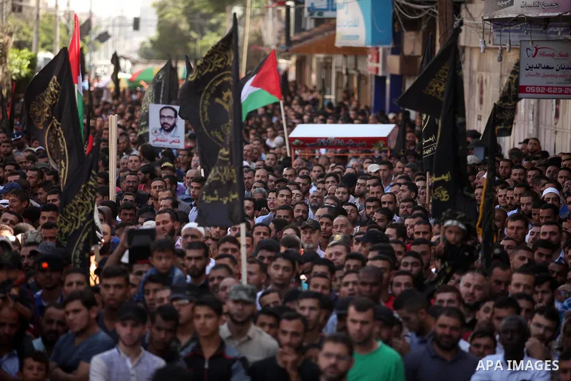 Palestinian supporters of the Islamic Jihad Movement take part in a demonstration marking the first anniversary of the so-called Al-Quds uprising in Gaza city, on October 2, 2016. Photo by Ashraf Amra