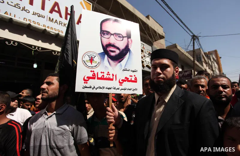 Palestinian supporters of the Islamic Jihad Movement take part in a demonstration marking the first anniversary of the so-called Al-Quds uprising in Gaza city, on October 2, 2016. Photo by Ashraf Amra