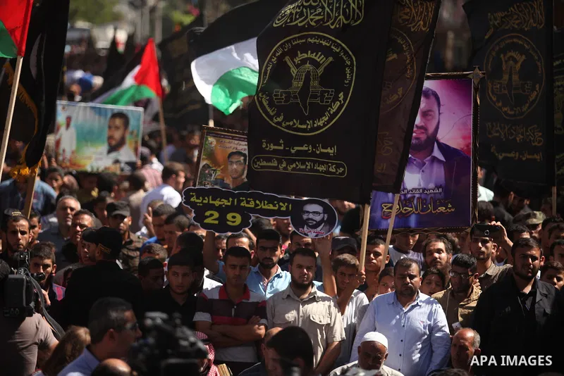 Palestinian supporters of the Islamic Jihad Movement take part in a demonstration marking the first anniversary of the so-called Al-Quds uprising in Gaza city, on October 2, 2016. Photo by Ashraf Amra
