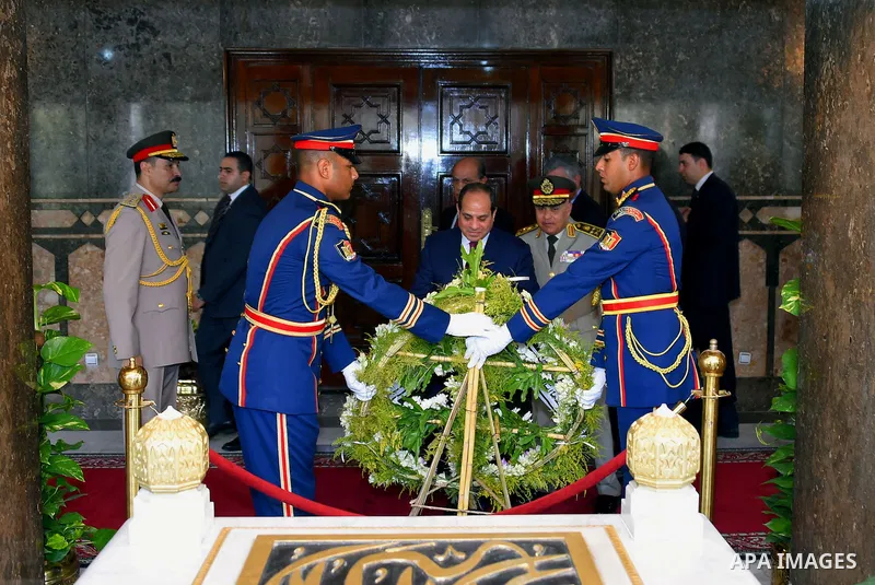 Egyptian President Abdel Fattah al-Sisi visits the graves of the unknown soldier, Egypt's former President Gamal Abdel Nasser, and Egypt's former President Anwar Sadat marking the 43th anniversary of the Oct. 6 Arab-Isra...