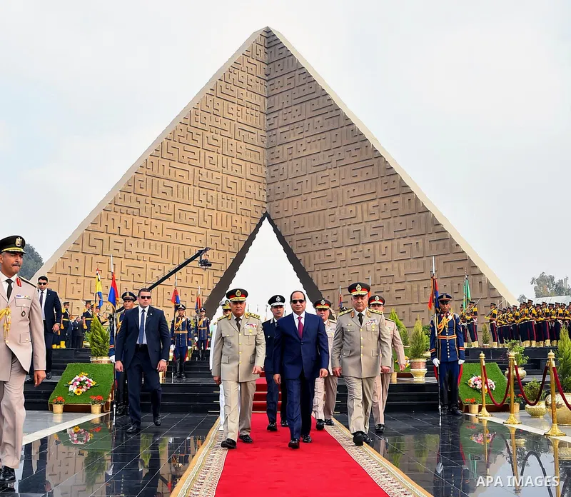 Egyptian President Abdel Fattah al-Sisi visits the graves of the unknown soldier, Egypt's former President Gamal Abdel Nasser, and Egypt's former President Anwar Sadat marking the 43th anniversary of the Oct. 6 Arab-Isra...