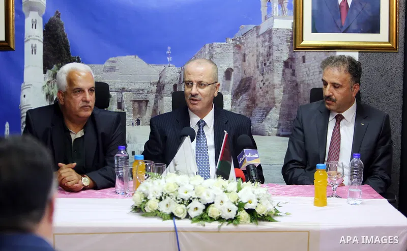 Palestinian Prime Minister Rami Hamdallah attends the opening of Palestine voice radio in the West Bank city of Bethlehem, on Oct. 04, 2016. Photo by Prime Minister Office