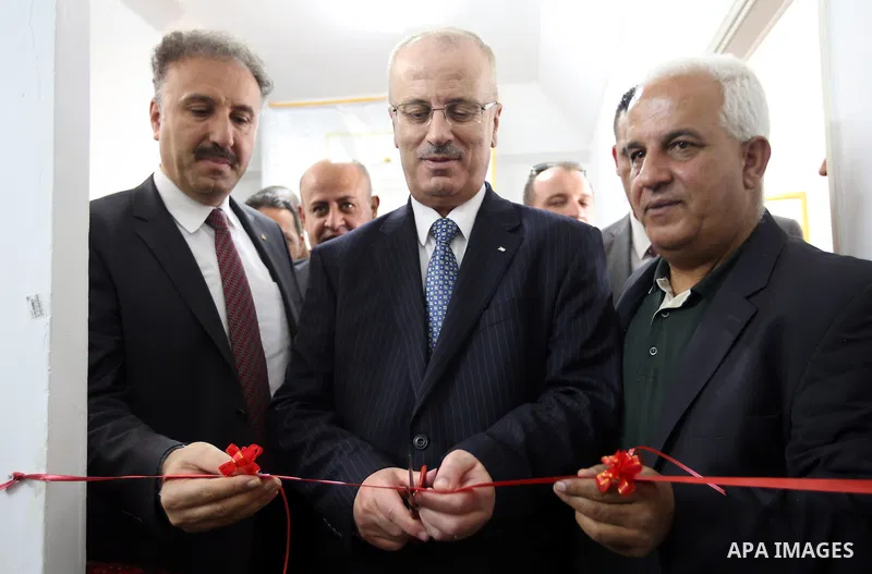 Palestinian Prime Minister Rami Hamdallah attends the opening of Palestine voice radio in the West Bank city of Bethlehem, on Oct. 04, 2016. Photo by Prime Minister Office
