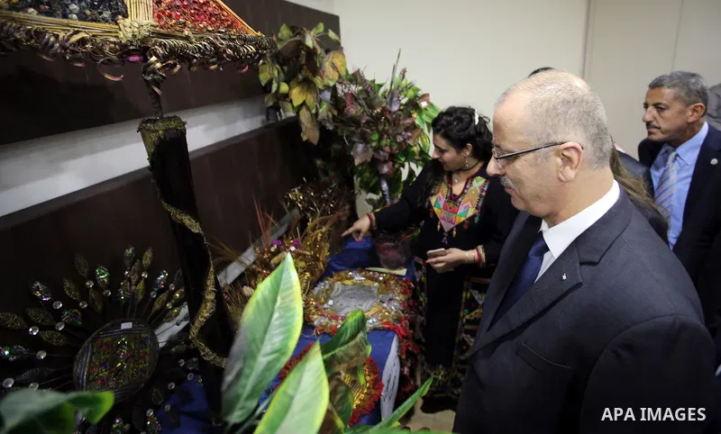 Palestinian Prime Minister, Rami Hamdallah, attends the launch of the national plan for sustainable production and consumption, in the West bank city of Ramallah, Oct. 05, 2016. Photo by Prime Minister Office